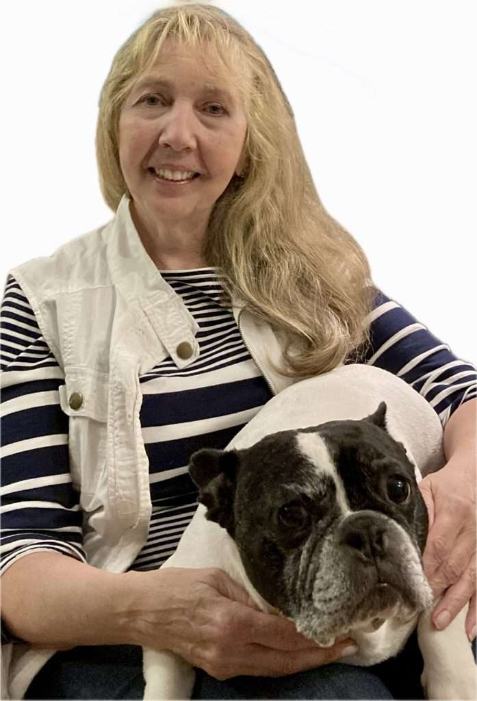 a pet partner member and her french bulldog